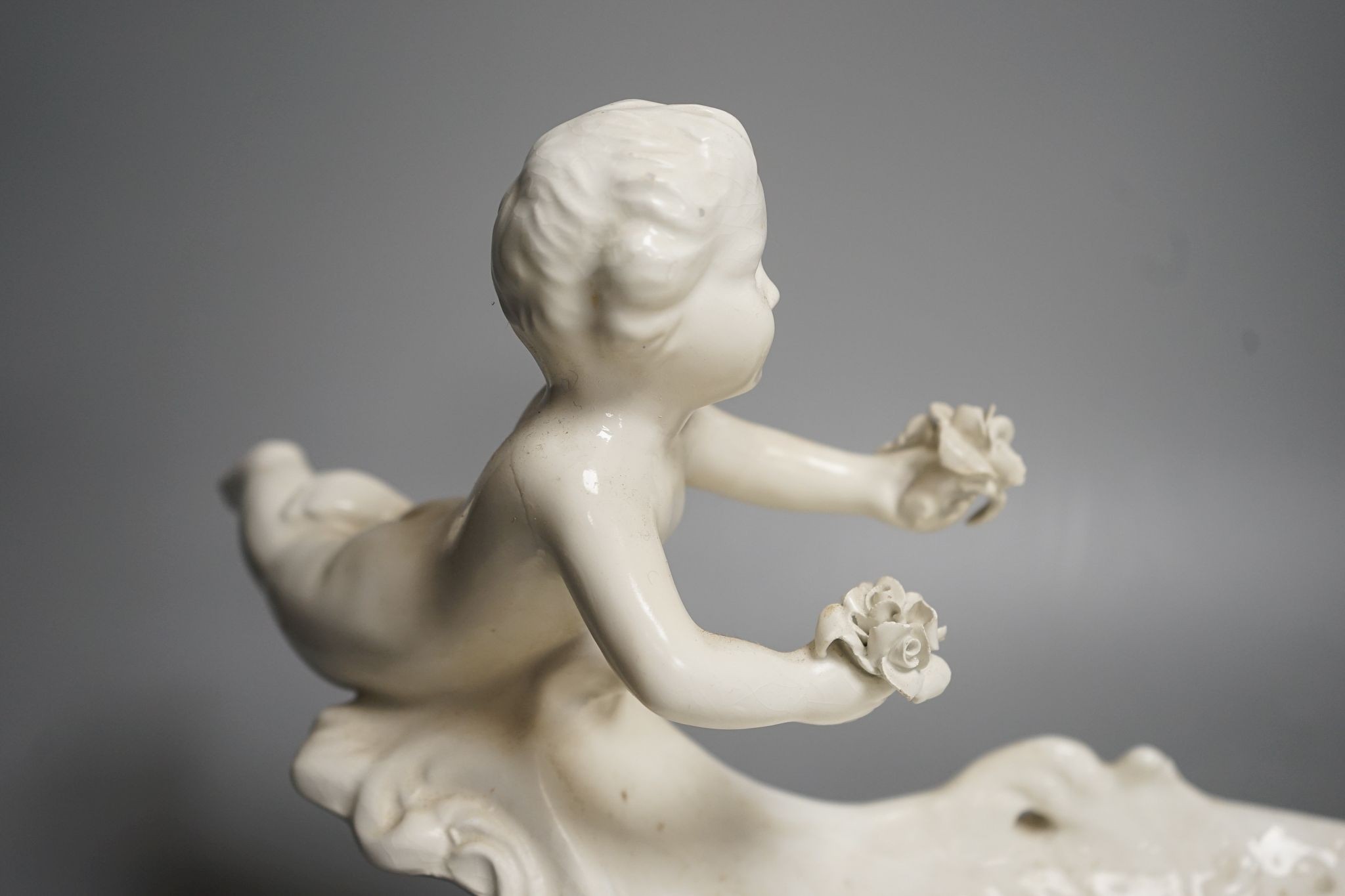 An Italian glazed pottery centrepiece, 63cm